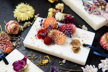 Dried flowers and candles made from dried flowers
