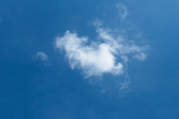 Cloudy sky in summer with bright turquoise morning. beautiful golden wispy cirrus clouds with turquoise sky cloud background with room for copy