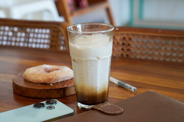 Palm sugar iced coffee, captured on April 28, 2025. A smooth blend of espresso, fresh milk, and rich palm sugar syrup, delivering a sweet, creamy, and bold Indonesian coffee flavor