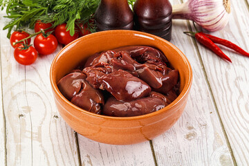 Raw chicken liver uncooked in the bowl