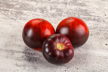 Black ripe juicy organic tomato