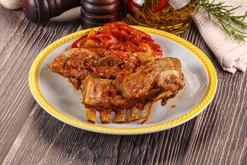 Baked lamb ribs with vegetables
