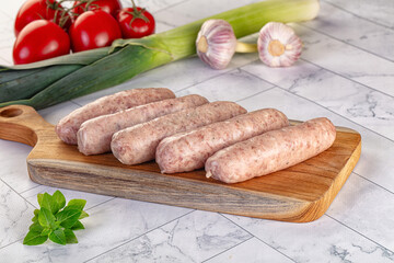 Raw pork sausages for grill