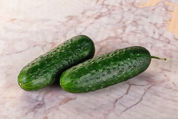 Ripe green raw two cucumbers
