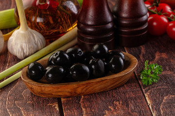Mediterranean marinated Black olives in the bowl