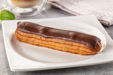 Gourmet chocolate eclair with icing