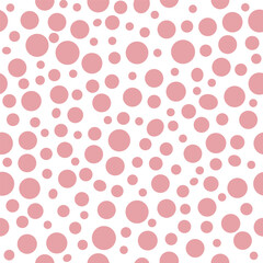 seamless polka dots pattern. cute pink polka dot seamless pattern design with random sized circles on white background perfect for fabric prints, wallpaper and surface decoration