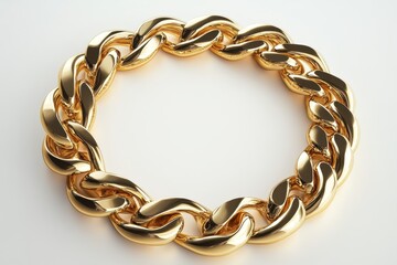 Fototapeta premium A golden chain bracelet lies on a bright white surface, shimmering brightly. Use it for concepts of fashion, wealth, or a jewelry product promo.