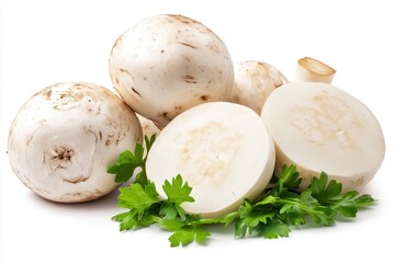 Fresh white mushrooms sliced and arranged with parsley on a clean surface for culinary use