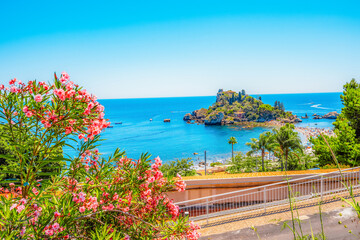 Isola Bella is small island near Taormina, Sicily, Italy.  Beach in azure waters of Ionian Sea.