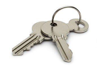 Two metal keys on a ring isolated against white background, close-up