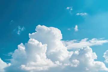 Fluffy white cloud on bright blue sky for tranquil nature photos and calming landscape visuals
