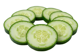 Circular arrangement of fresh cucumber slices on a dark surface