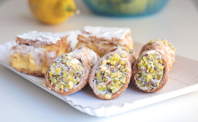Cannoli traditional dessert of Italy. Food and sweets. Tubes of dough with filling. National cuisine. 