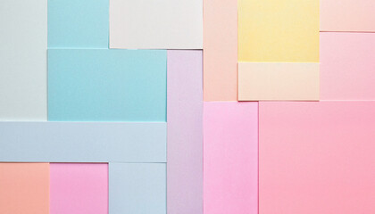 Fototapeta premium Colorful paper sheets arranged in a pastel mosaic pattern 