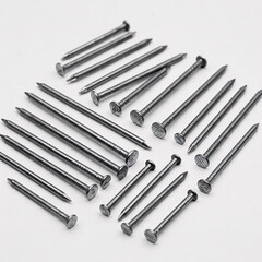 Metal nails on a white background. Shallow depth of field.