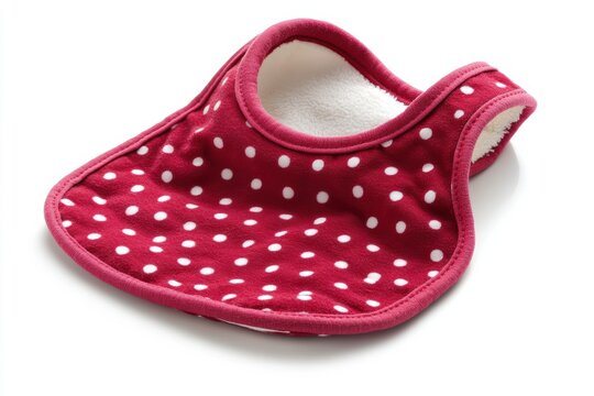 Cute red bib with white polka dots ideal for mealtimes and baby messes