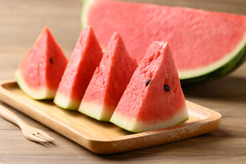 Sliced of watermelon on wooden plate ready to eating, Tropical fruit in summer season