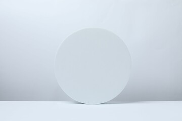 White podium on a light background