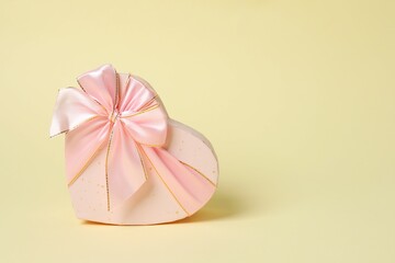 Beautiful gift box on color background