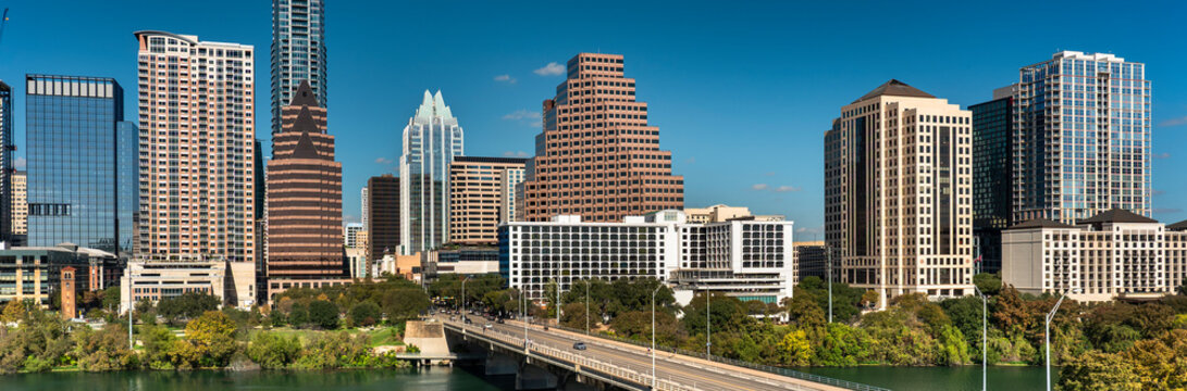 Austin Texas skyline panorama over Colorado River and Congress Bridge