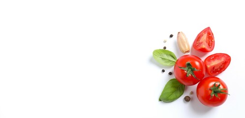 Fresh red tomatoes, pepper and basil on white background, top view