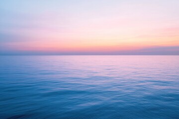 Obraz premium Blurry sunset over calm sea