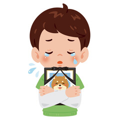 愛犬の遺影を抱いて泣く男の子