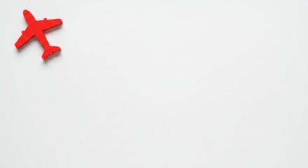 Fototapeta premium Red airplane icon flying on a clean white background 
