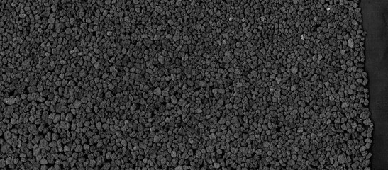 Dark Gravel Texture Background Close up Macro View of Small Pebbles and Stones