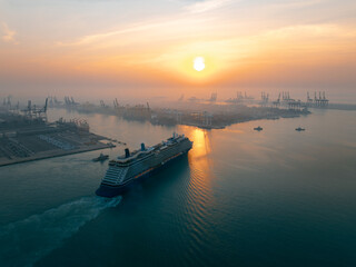 luxury transportation, large cruise ship docked at pier in the norming over the sunlight backgrounds