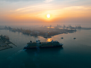luxury transportation, large cruise ship docked at pier in the norming over the sunlight backgrounds