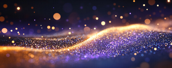 A blue and gold sparkly surface with many small dots. The surface is a wave of glitter