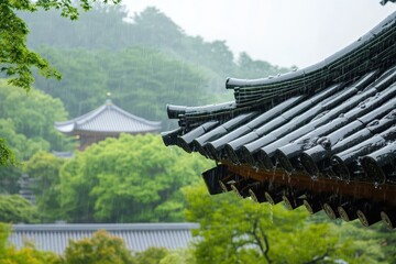 Rain Dripping from Traditional Temple Roof with Blurred Green Trees Background