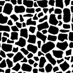Seamless animalistic giraffe skin pattern. Fashionable black and white background. Hand drawn animal texture for print, textile, fabric, packaging.