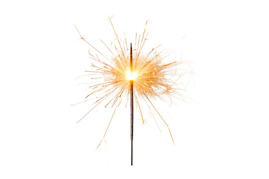 Burning sparkler stick with bright golden sparks against a gray background transparent background
