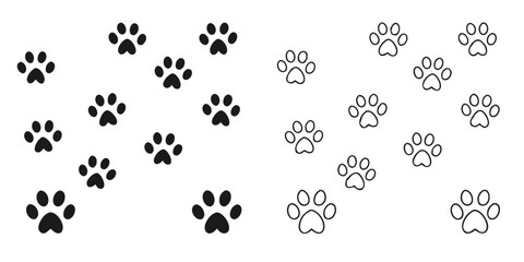 Fototapeta premium Set of black paw prints animal tracks on a white background