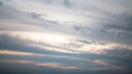 Fototapeta premium Overcast sky with soft, diffuse light creating a moody atmosphere. Gentle cloud coverage, muted tones, and subtle illumination evoke serenity and tranquility in nature.