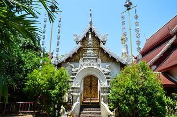 Naklejka premium Chapel, Lanna Architecture, Symbols of Buddhism, South East Asia at Wat Maha Wan, Chiang Mai, Northern Thailand
