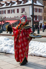 Disguised Person with Chinese Fans - Annecy Venetian Carnival 2013