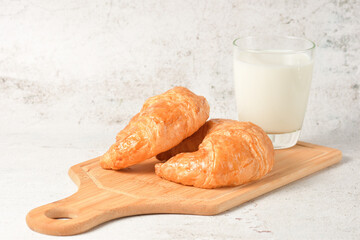 highkey photography of Croissants and milk, homemade morning dayly breakfast.