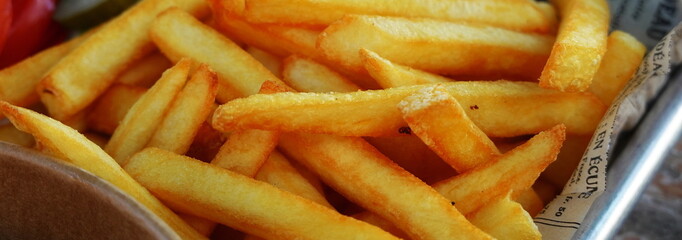 Crispy Golden French Fries Closeup Focus Warm Lighting Food Concept