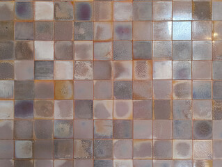 Close up of neutral color tiled wall