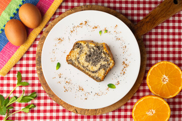 Delicious lemon and poppy seed cake. Top view table.