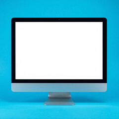 Fototapeta premium Computer monitor with blank screen isolated on blue backdrop. Mock-up.