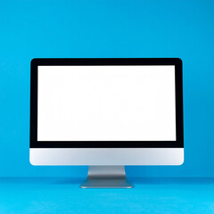Fototapeta premium Computer monitor with blank screen isolated on blue backdrop. Mock-up.