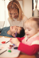 Family at home. Shallow DOF. Developed from RAW; retouched with special care and attention; Small...