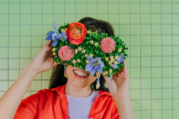 Woman wearing floral virtual reality glasses with a smile