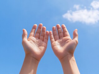 Hands reaching for blue sky