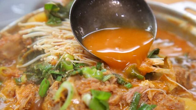Pork backbone stew with enoki mushrooms